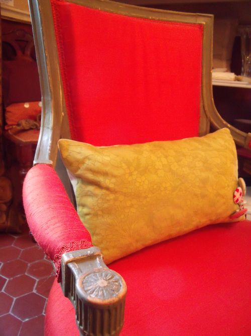 Coral silk armchair