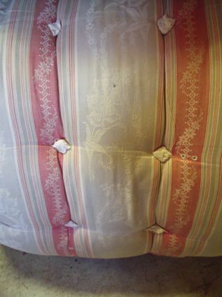 Old mattress in rose toile