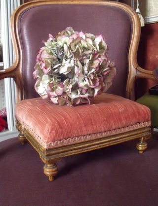 Pink gilded footstool