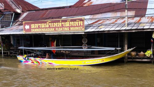 Long tail boat along the river