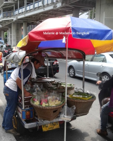 Streets of Bangkok fruits seller on Silom