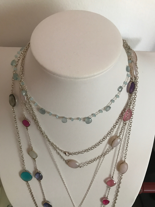 Layering of madame Siam necklaces 